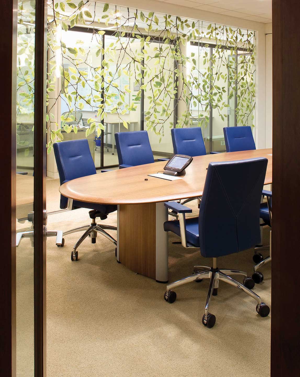Conference room with leaf graphic