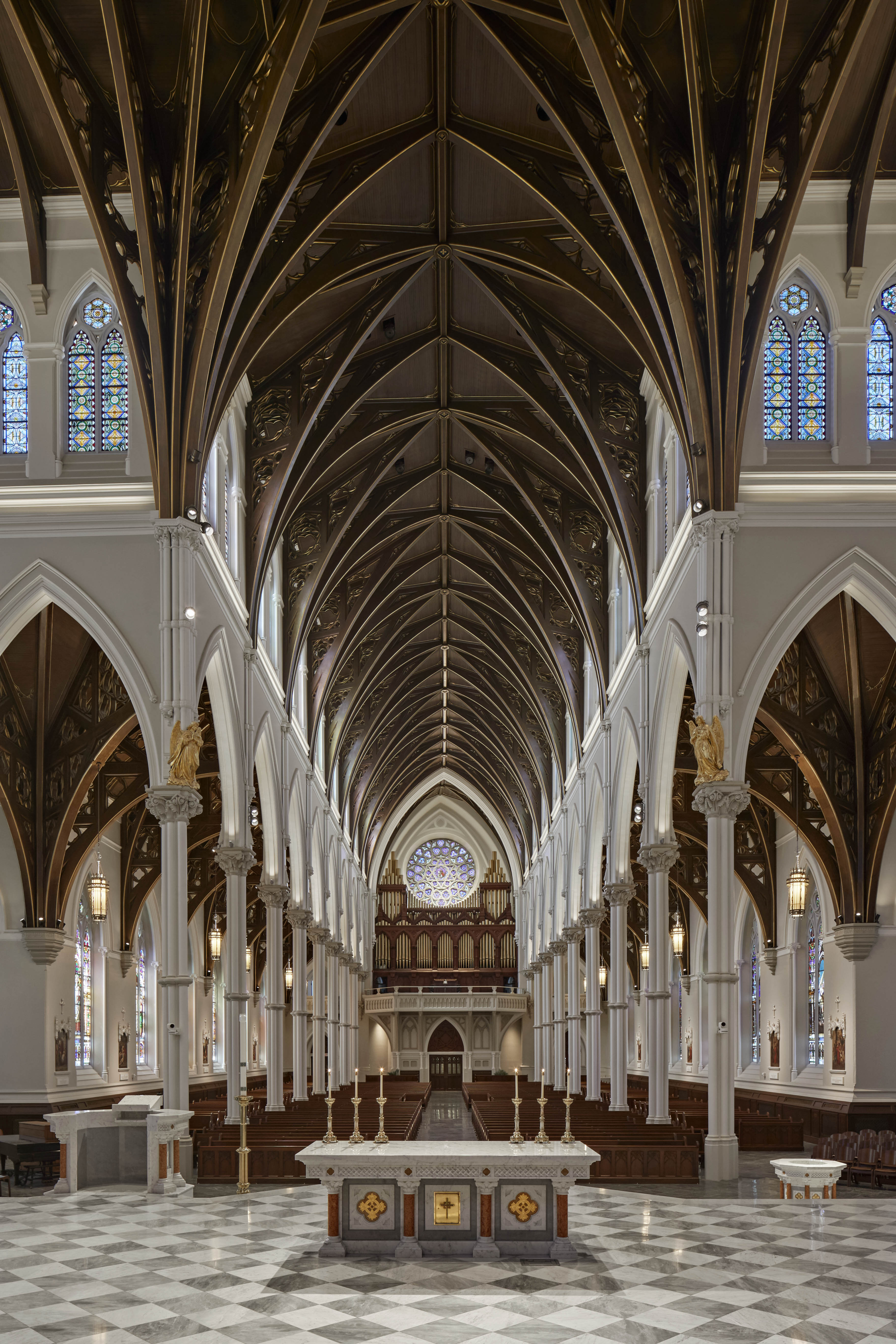 Cathedral of the Holy Cross interior nave looking toward rose window