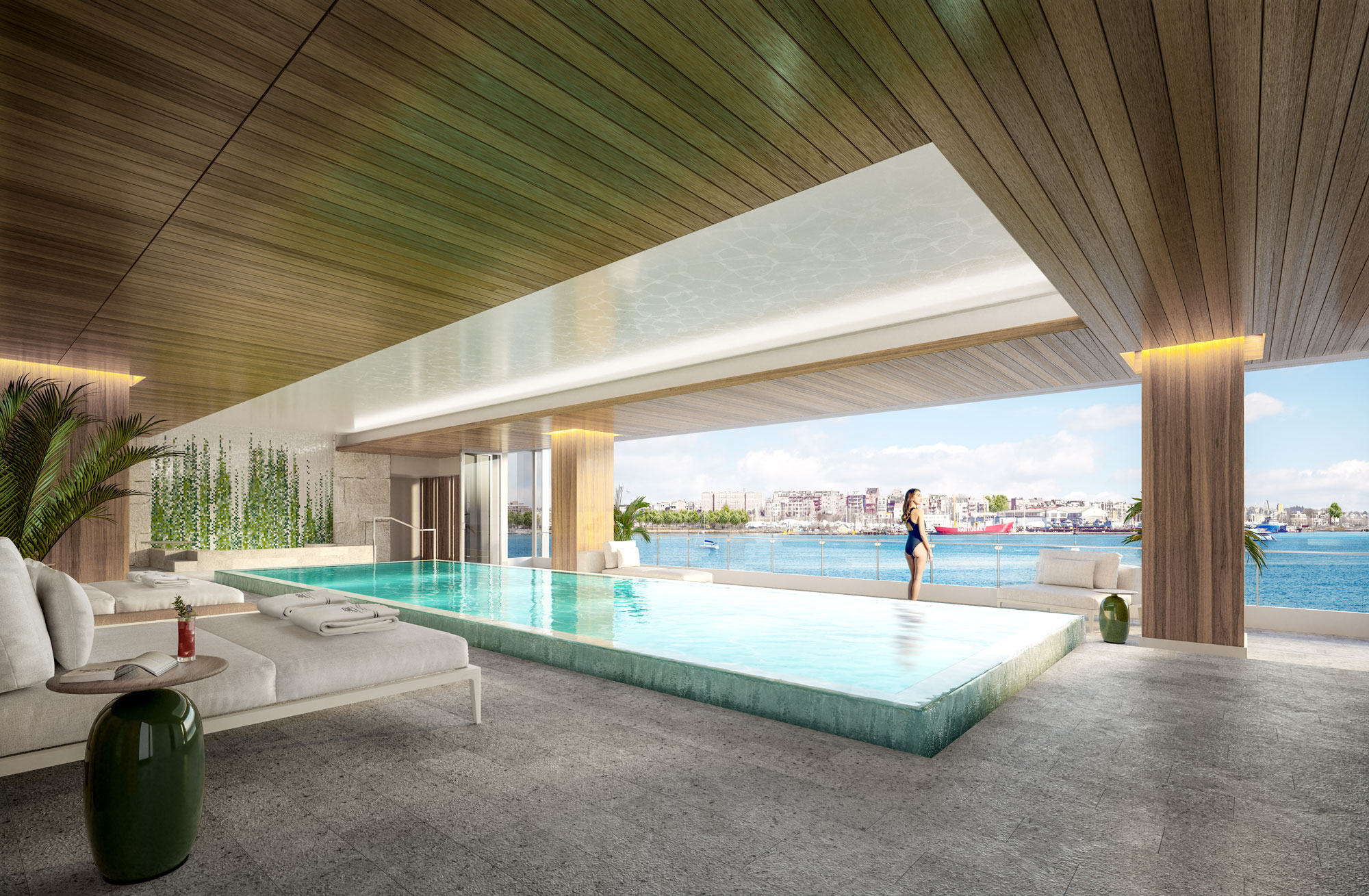 Woman in bathingsuit at pool at the St. Regis Residences, Boston